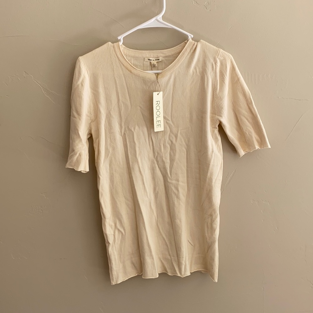 Cute soft sweater like tee.